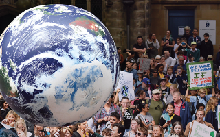 Empowering People, Saving the Planet: A Case for Direct Democracy 